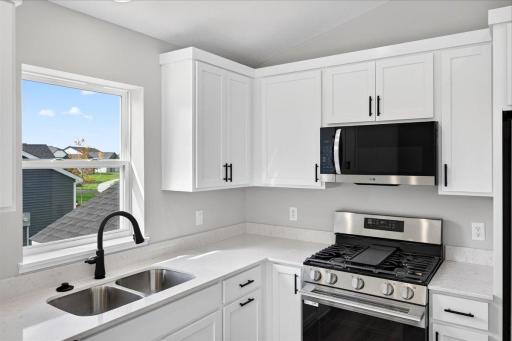 Photo taken of another home with similar plan and finishes.