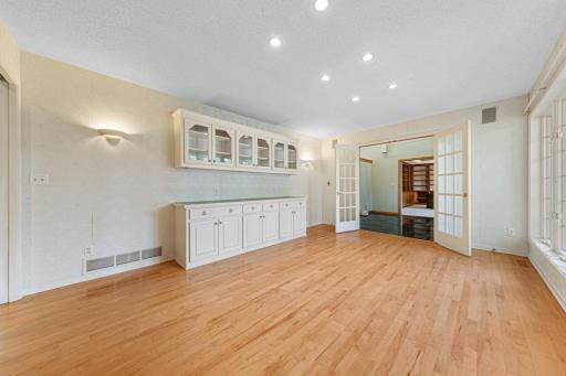 Formal Dining - Built in Cabinets - Note the French Doors