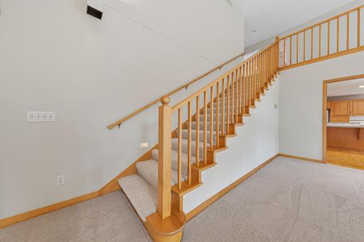 Staircase leading to loft, bathroom and two bedrooms