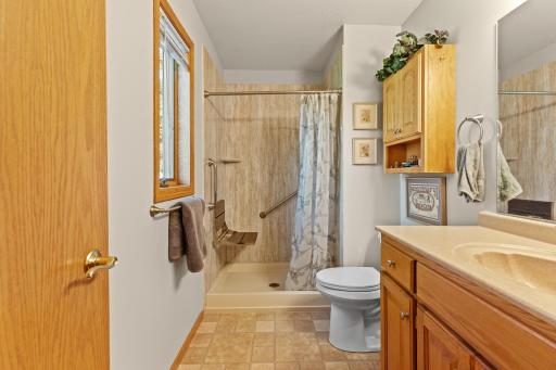 Primary bath with walk-in shower w/ fold up chair