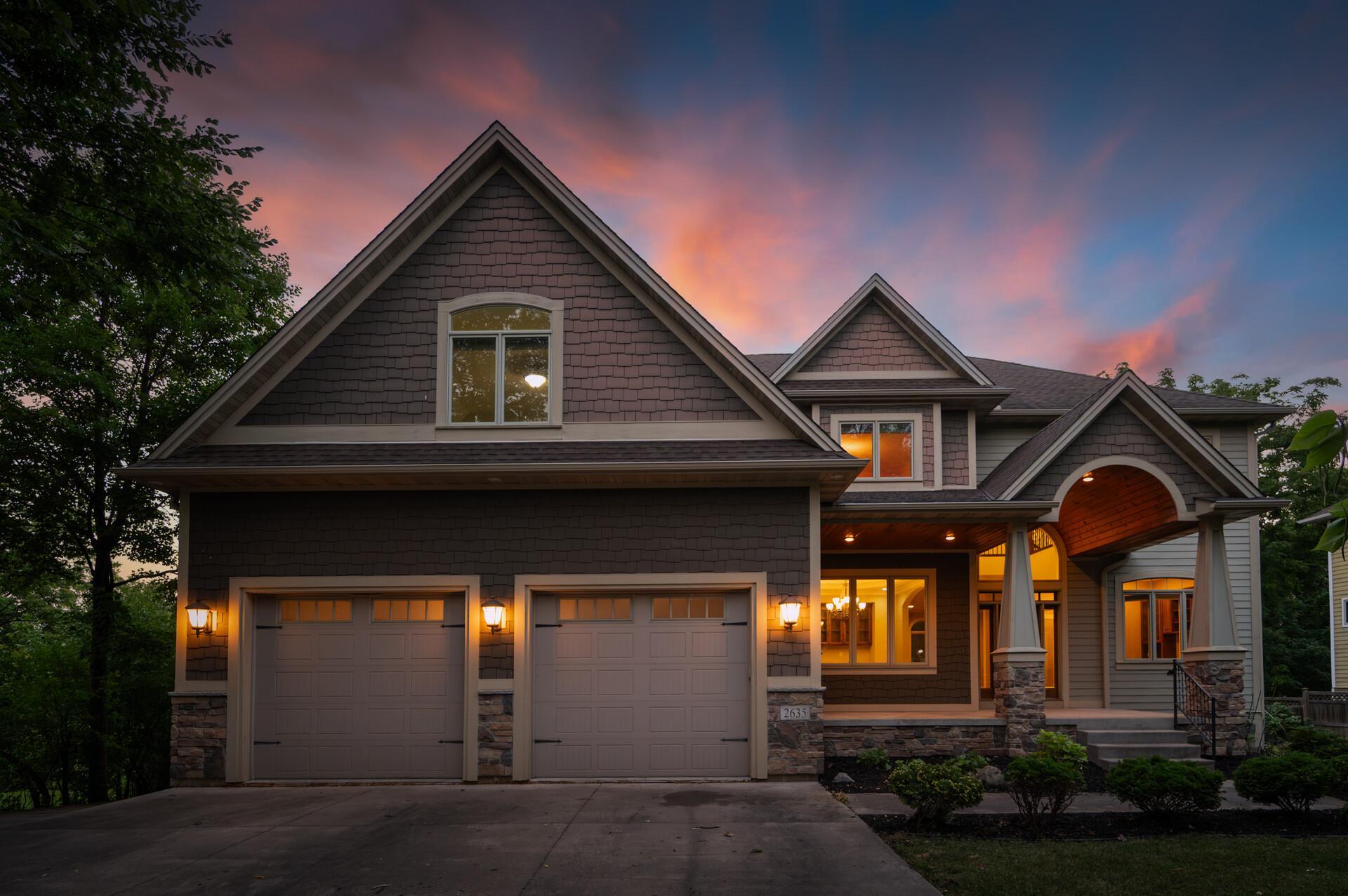 Welcome to 2635 Nathan Lane N—an exceptional Plymouth residence where builder-level craftsmanship, grand proportions, and a coveted setting just a short walk from Medicine Lake come together.