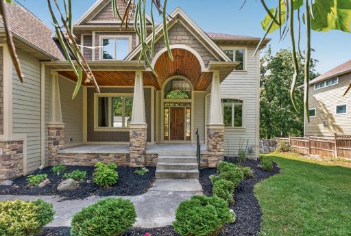 More than an entrance, this grand covered porch creates a memorable sense of arrival.