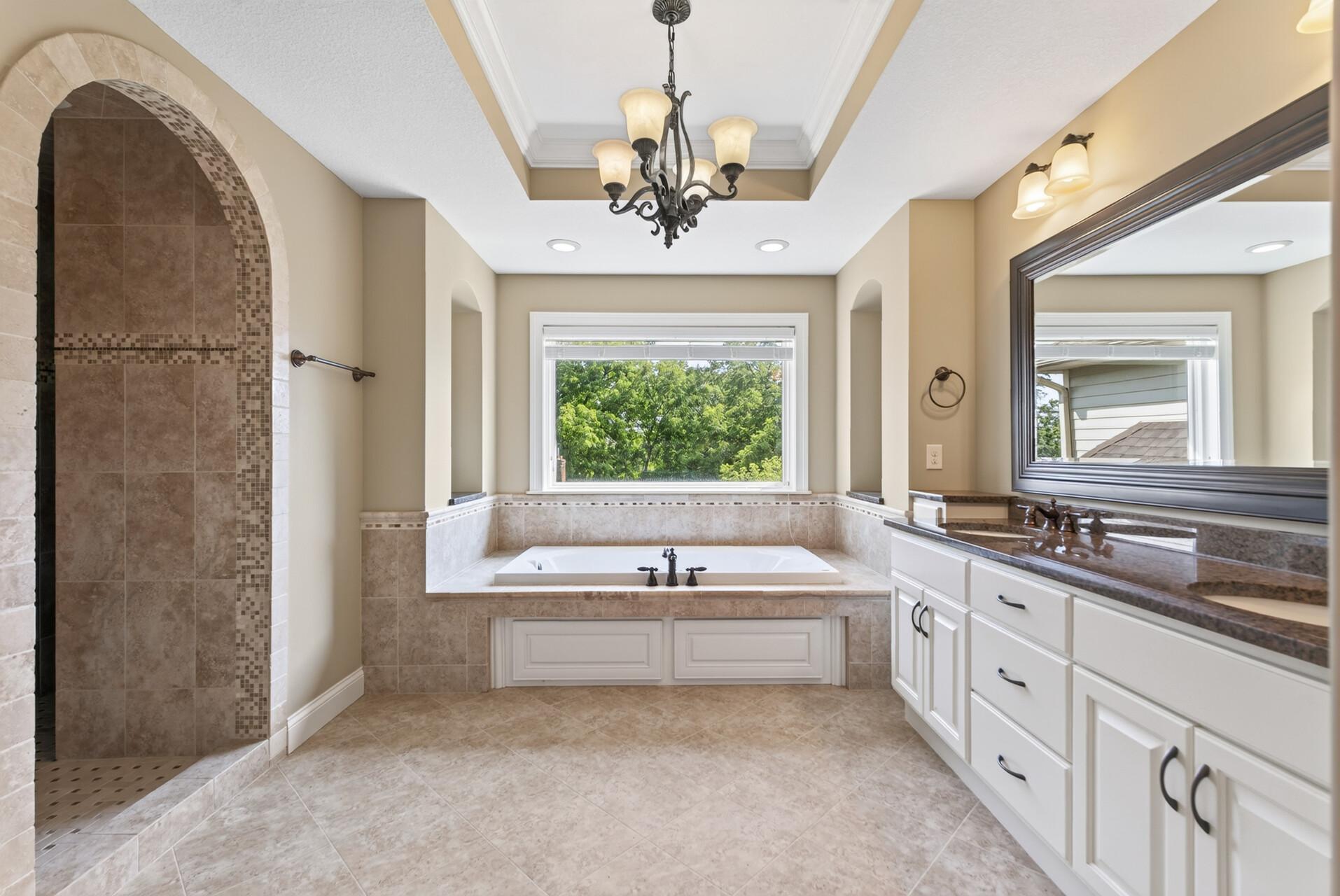 The private ensuite continues the primary suite’s sense of comfort and luxury.