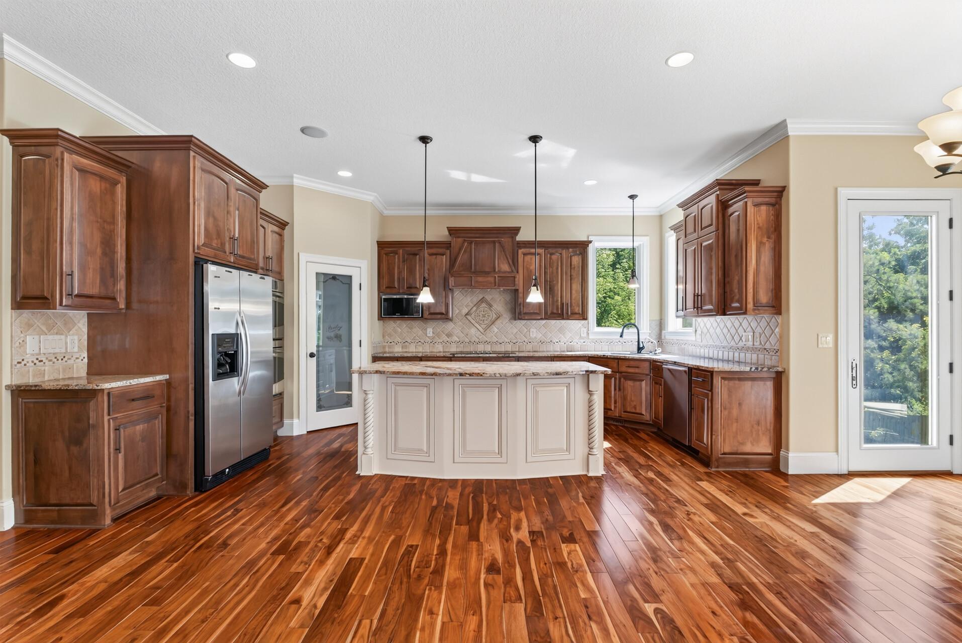 At the heart of the home, the gourmet kitchen was designed with both everyday living and entertaining in mind.
