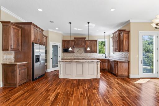 At the heart of the home, the gourmet kitchen was designed with both everyday living and entertaining in mind.