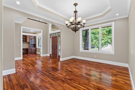 Refined details and generous proportions create a formal dining room that feels timeless, elegant, and ready to entertain.