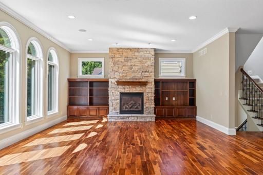 The gas fireplace creates a warm focal point and a natural gathering place at the heart of the home.