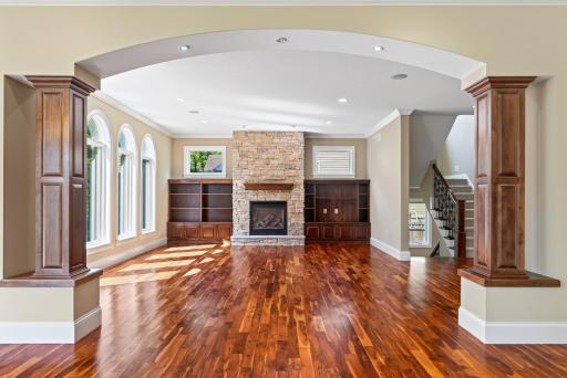 Crown molding and architectural details elevate the room while maintaining a comfortable, welcoming atmosphere.