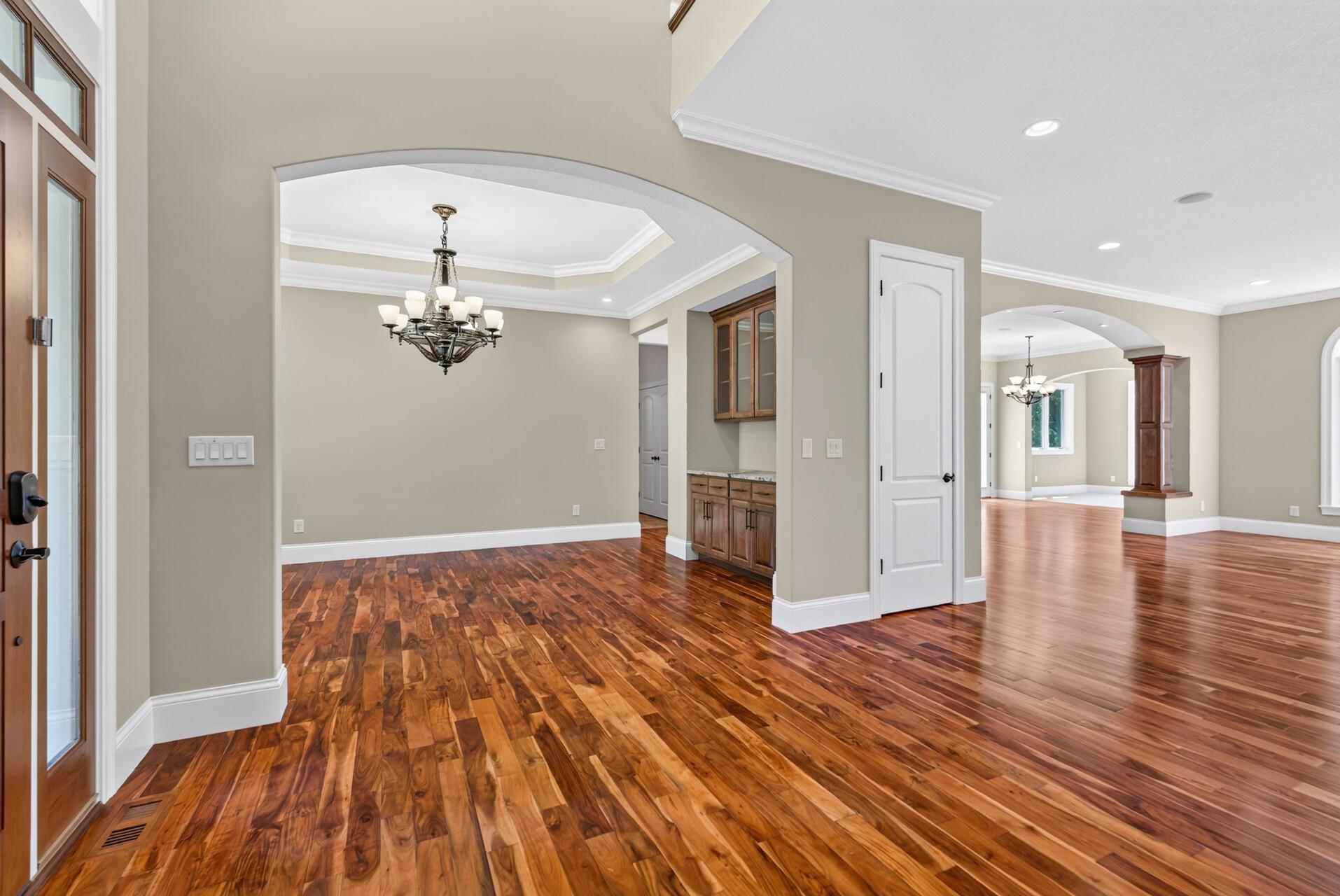 An elegant formal dining room creates an impressive setting for memorable dinners and special occasions.