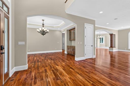 An elegant formal dining room creates an impressive setting for memorable dinners and special occasions.