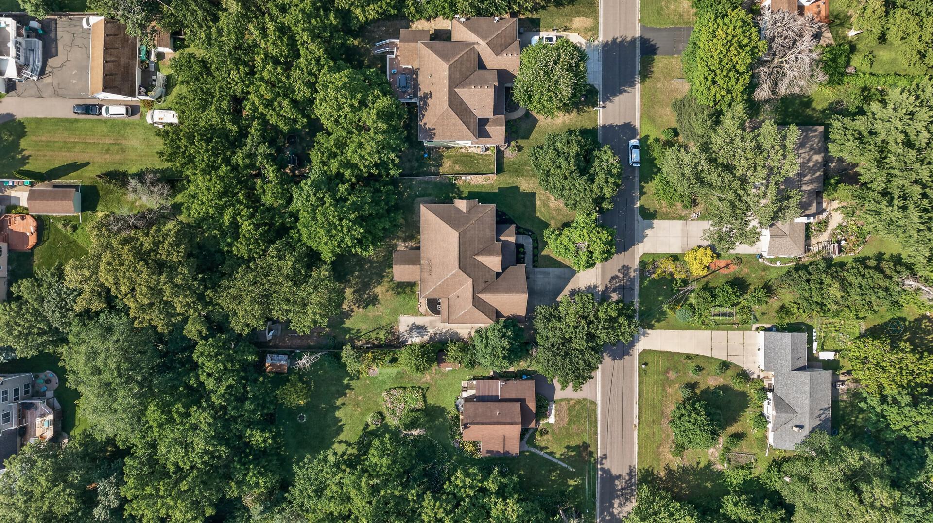 Mature trees surround the property, creating a beautiful sense of privacy and an established setting that feels tucked away from the everyday.