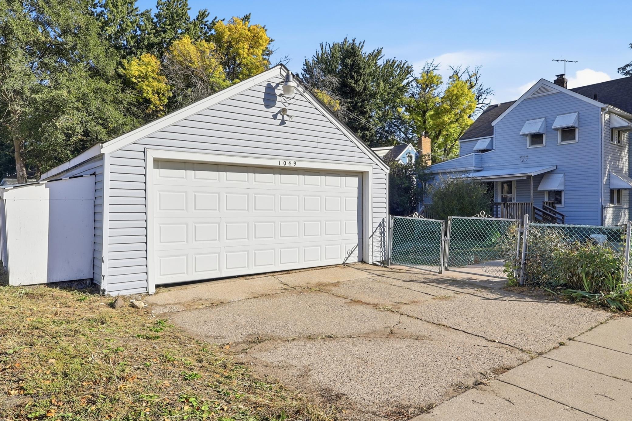 Full 2 Car Garage with Bonus Shop