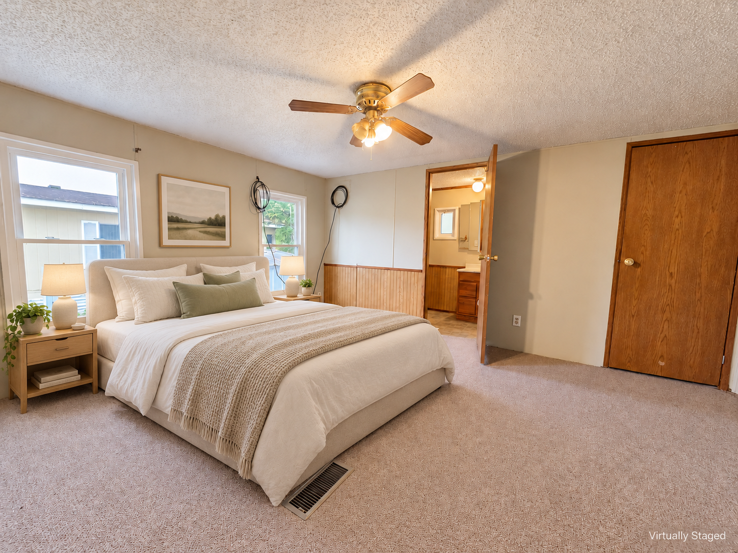 (virtually staged) Primary bedroom with private bath