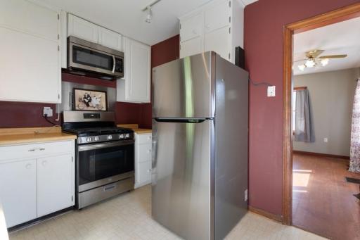 Kitchen sits right off the living/dining room with close porch access for grilling
