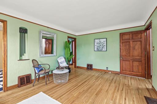 Living room with hallway to bedrooms and bathroom