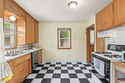 Fun checkerboard flooring is a perfect compliement to the vintage look