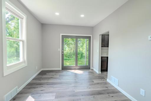 Formal dining room with patio door outside