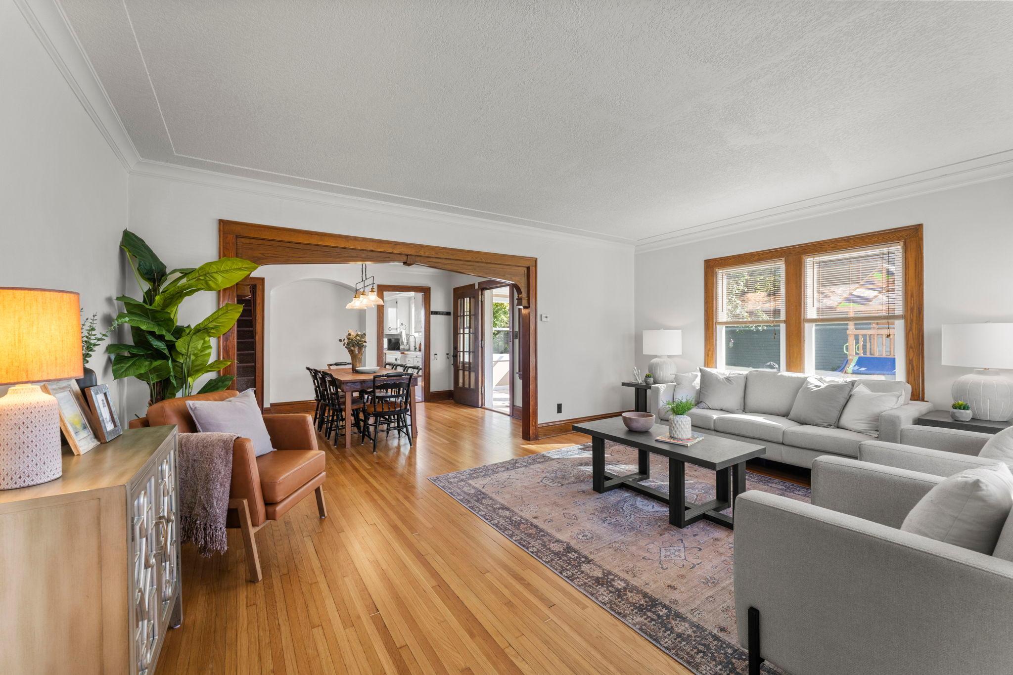 Generous sized living room with refinished hardwood floors