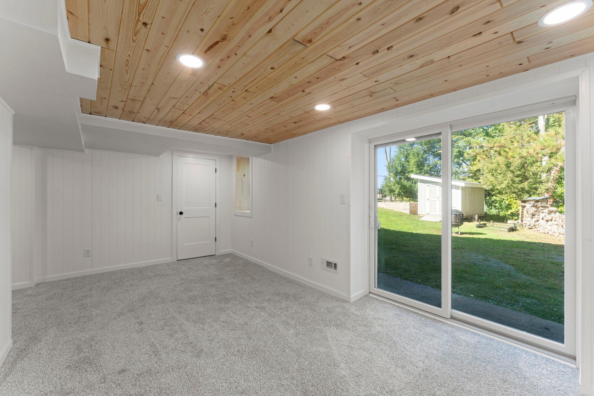 New recessed lights, view of the side yard and patio area