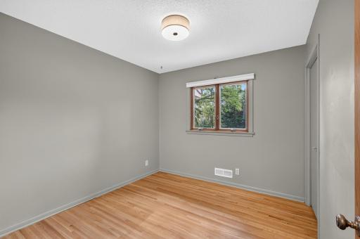 A look at the 2nd bedroom. Notice hardwood floors throughout much of the main floor!