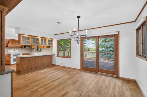 The dining room is a great space to host and have dinners as it connects to the kitchen, living room, and backyard deck!