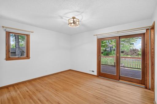 The primary bedroom also can step onto the outdoor deck!