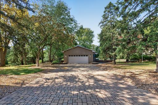 Fantastically landscaped all around including a paver driveway.