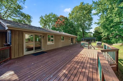 The backyard deck goes the length of the house!
