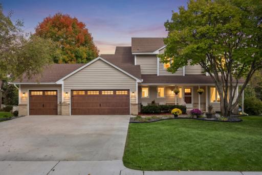 Welcome to 8860 Everest Lane N, an updated 4BR, 4BA two-story walkout with a 3-car garage in Maple Groveâs The Commons.