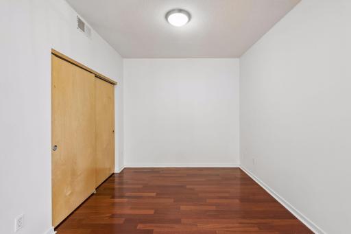 Designated dining area conveniently located next to the kitchen, with plenty of space for a dining table and additional storage nearby.