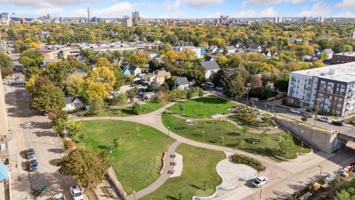 Enjoy urban living surrounded by green space! Located next to neighborhood parkland and the Midtown Greenway, with convenient access to walking and biking trails, downtown Minneapolis and local amenities.