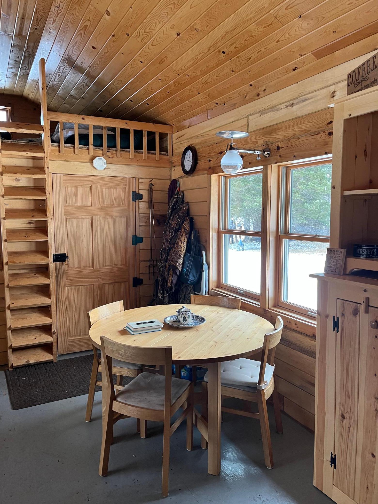 Cabin interior 2 dining table and loft.jpeg