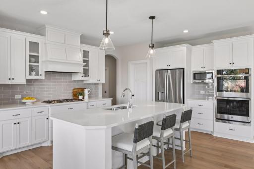 All our features are standard including the granite countertops, tile backsplash and under mount kitchen sinks.
