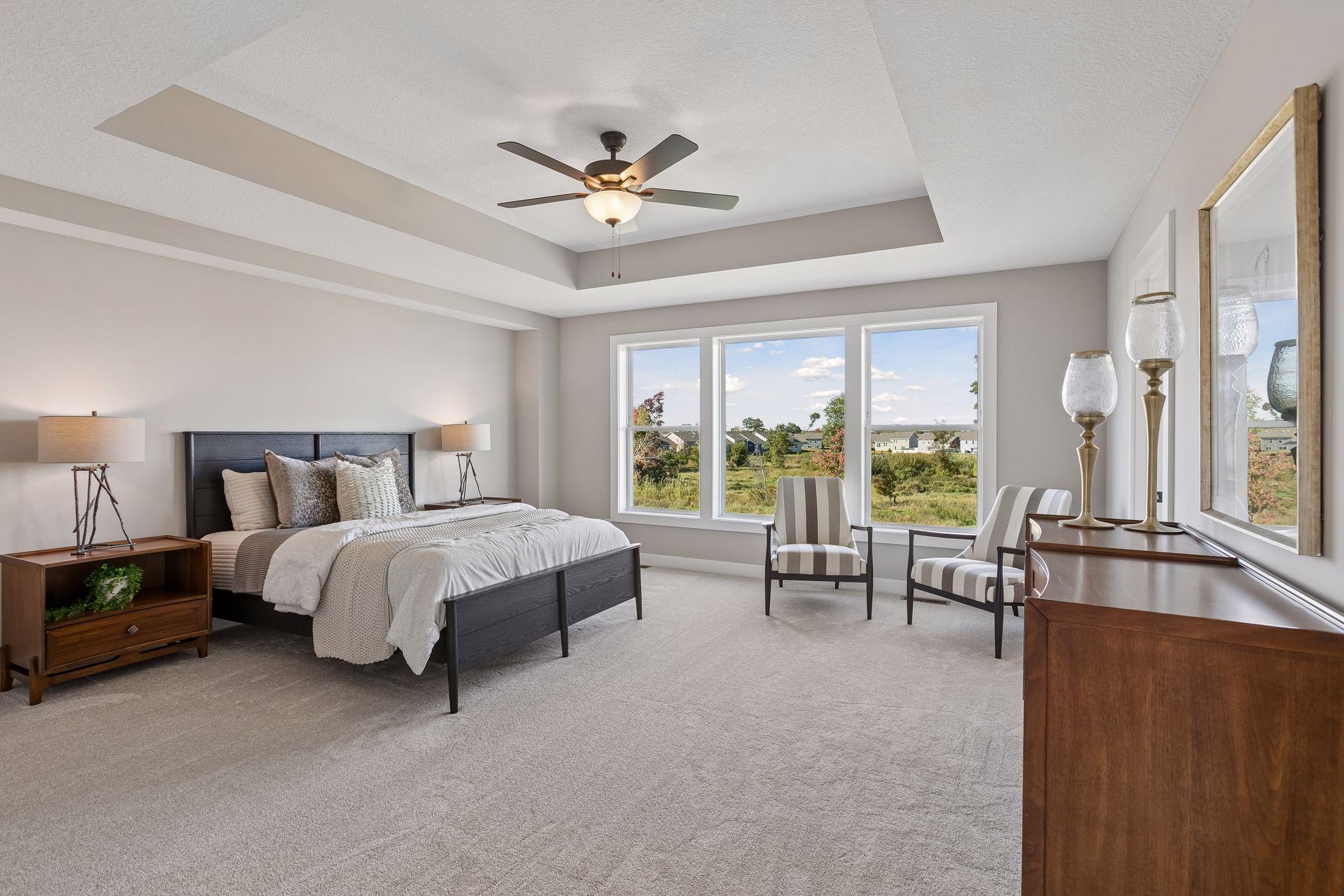 Open the grand French doors into your very own owner's suite with a private bath.