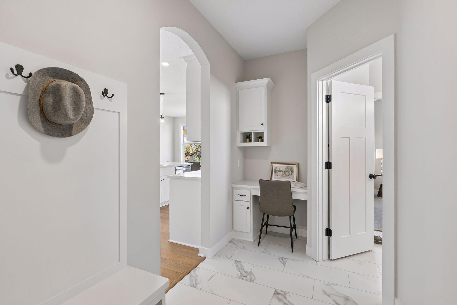 The spacious mud room helps your home stay organized.