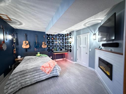 Basement Bedroom 5 with Electric Fireplace