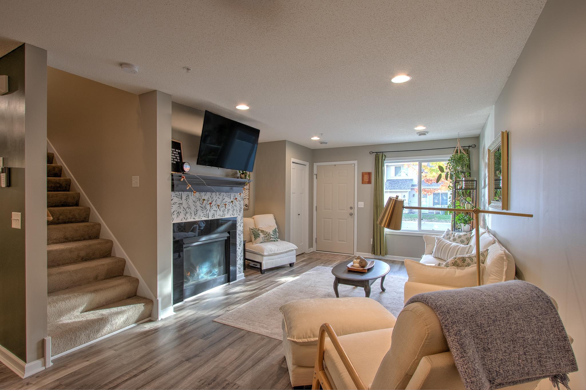 Cozy living room complete w/ gas fireplace