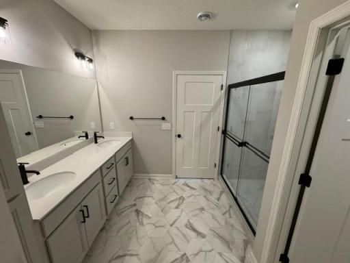 Magnolia - Owner's Suite Bath 1 - Lot 61.jpg