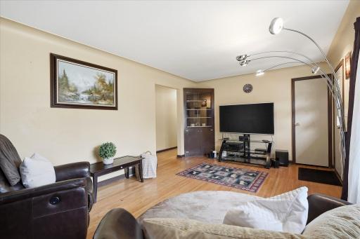 Spacious living room offers plenty of flexibility for seating and entertaining.