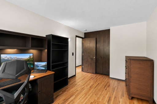 Versatile bedroom or home office-Upper featuring beautiful hardwood floors and great natural light!