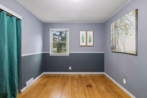 One of 3 main level bedrooms all with hardwood floors