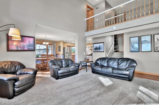 2 story vaulted living room with catwalk above to the 3 large bedrooms.