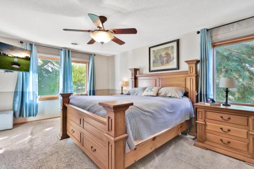 Primary bedroom with fantastic lake views.