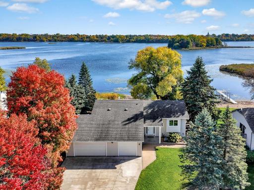 Beautifully updated home with 4 car garage and spacious concrete drive.