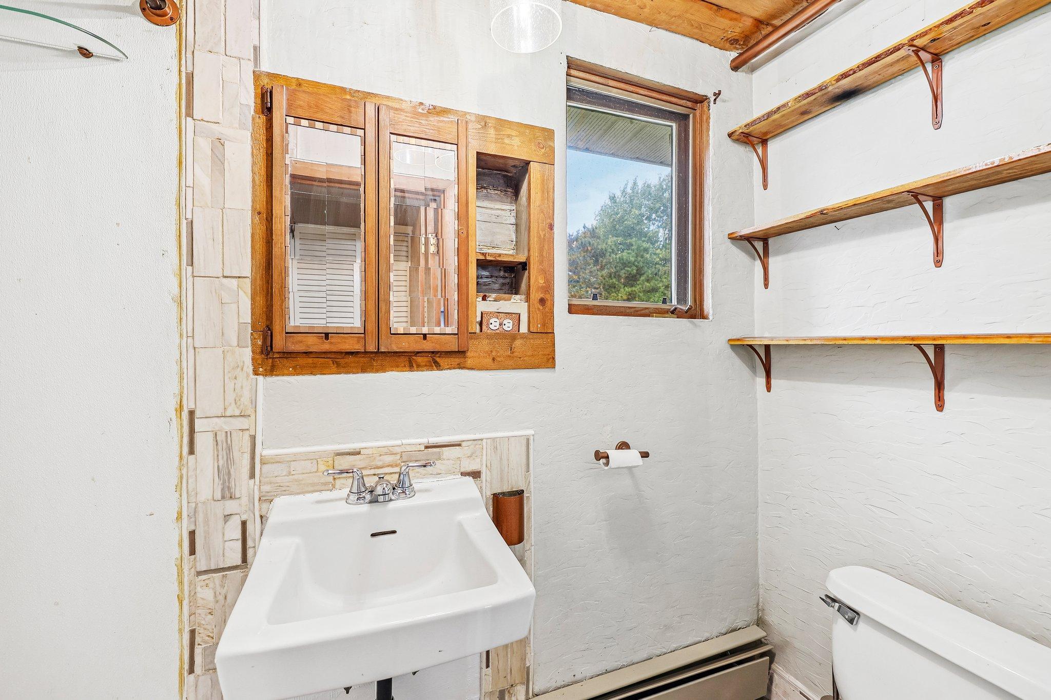 Bathroom in in-law unit 1.