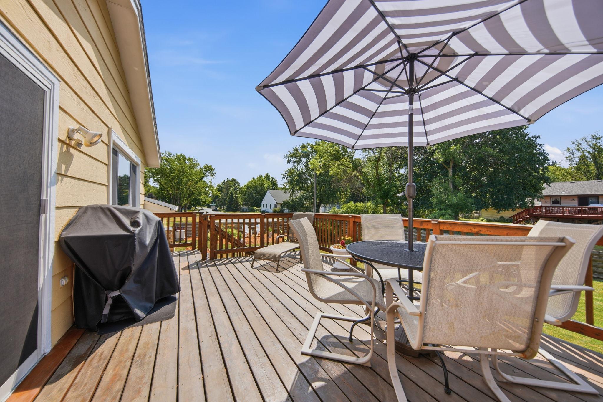 Deck with stairs leading to the backyard.