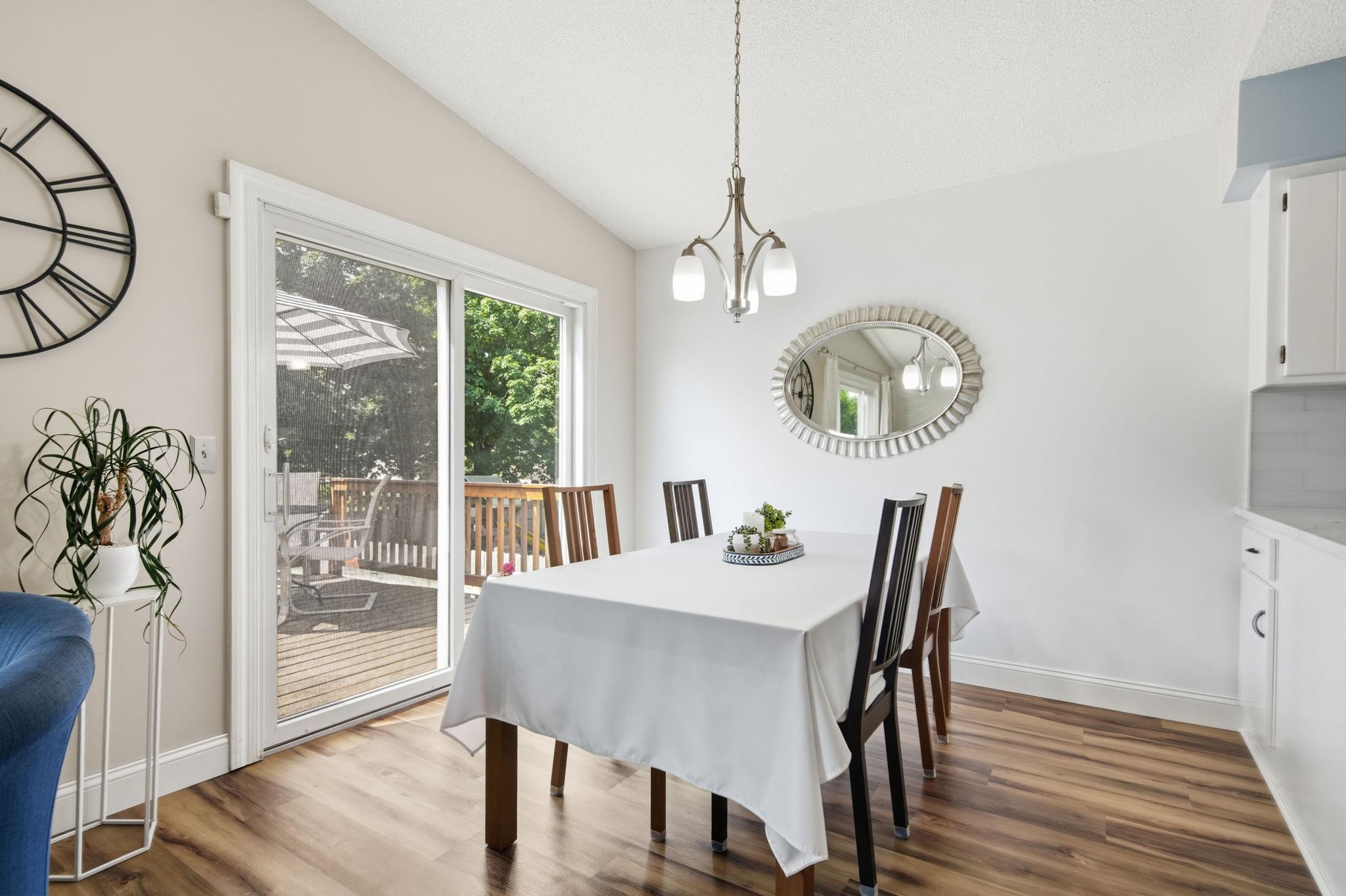 Dining room has sliding patio door leading to the deck.