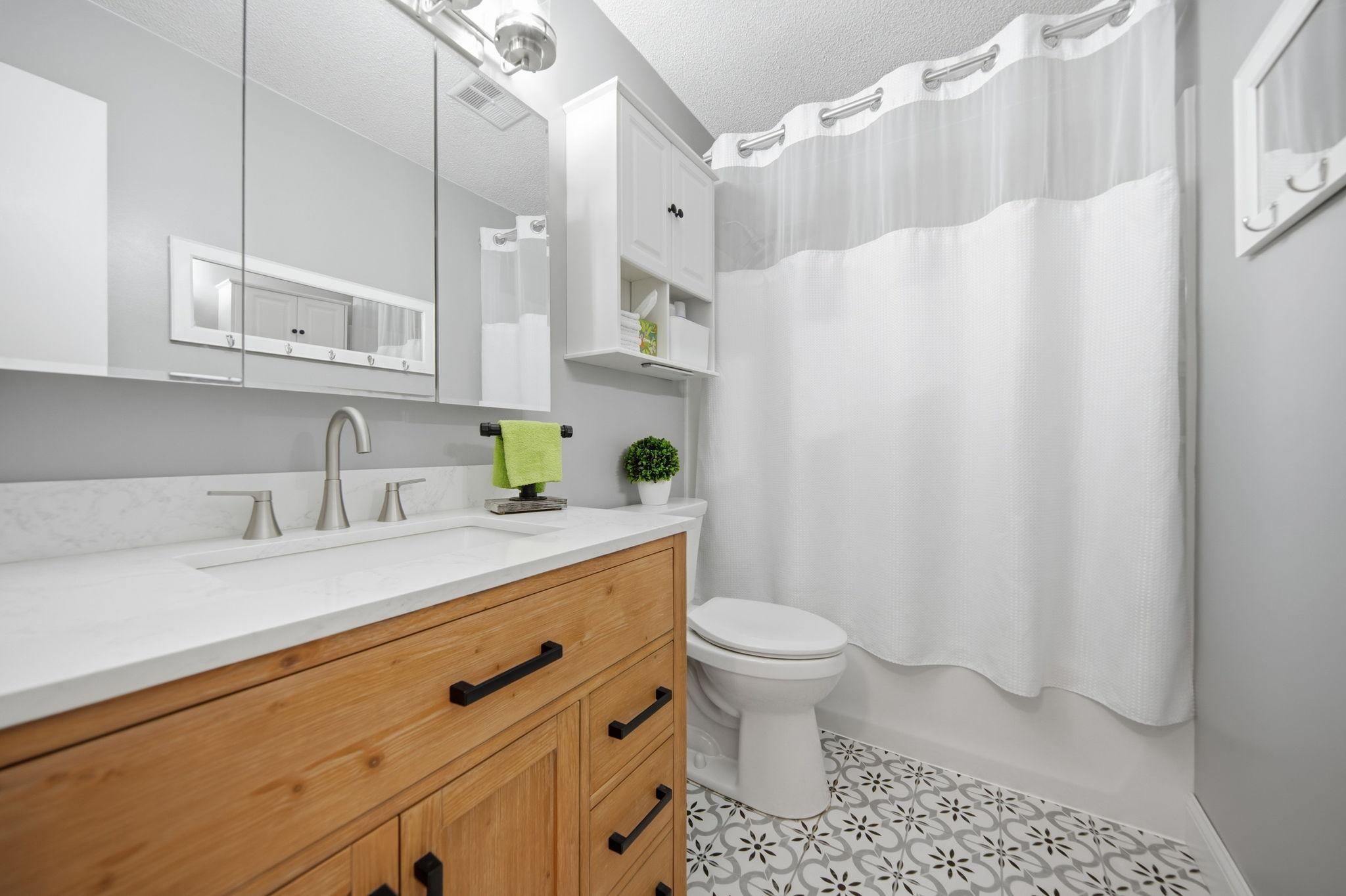 Remodeled upper level full bathroom.