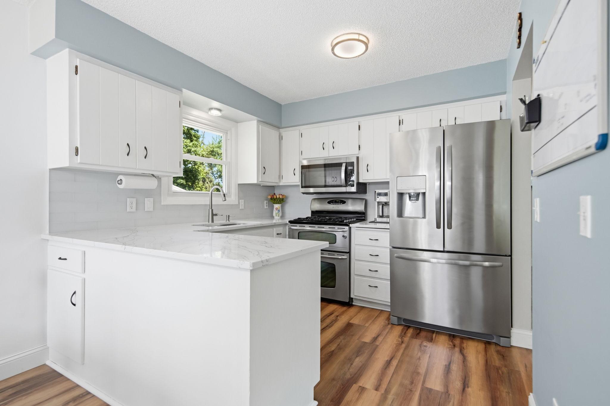 Updated kitchen with newer stainless appliances!