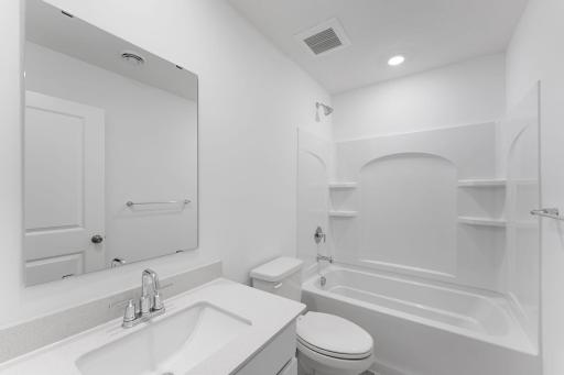 Photo of a similar home, actual finishes may vary